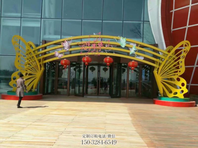 长春蝴蝶拱门雕塑,镂空烤漆效果,不锈钢小区标识雕塑 长春蝴蝶拱门雕塑,镂空烤漆效果,不锈钢小区标识雕塑